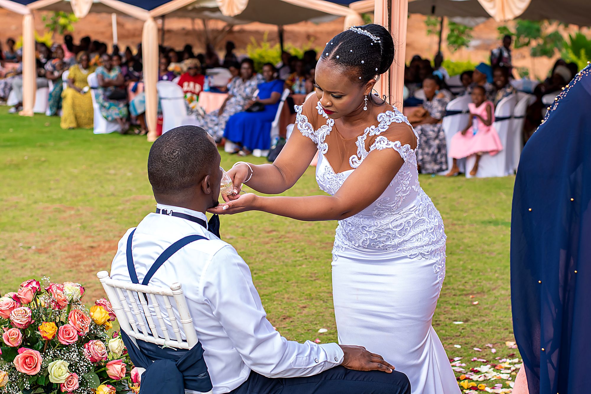 Bride sharing a toast with the groom at their reception